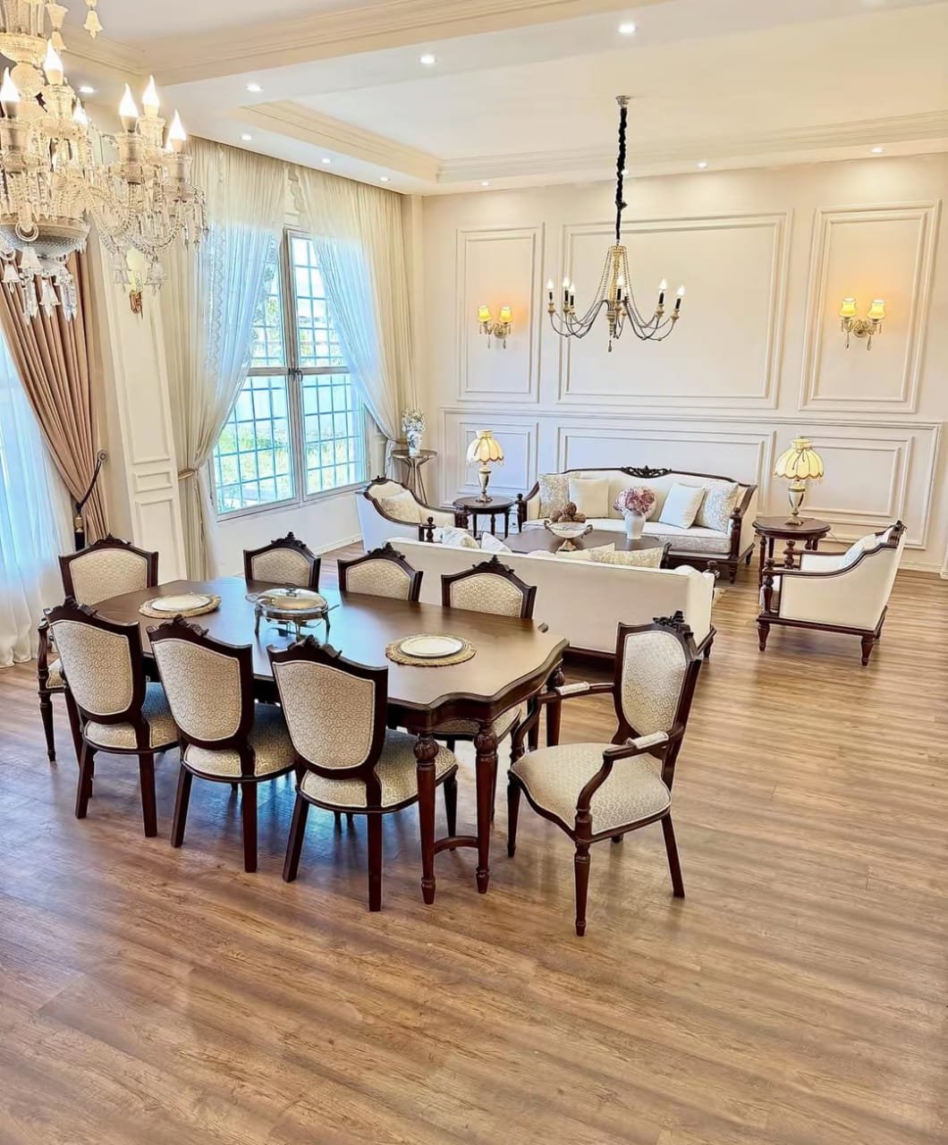 A formal dining set with wooden chairs in a bright interior